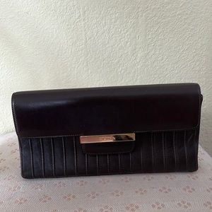 At John clutch bag and shoulder bag convertible never been used chocolate brown
